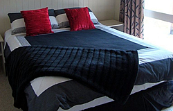 Blue Mountain Cottages are located on the Southern Scenic Route between Te Anau and Manapouri in Southland.
